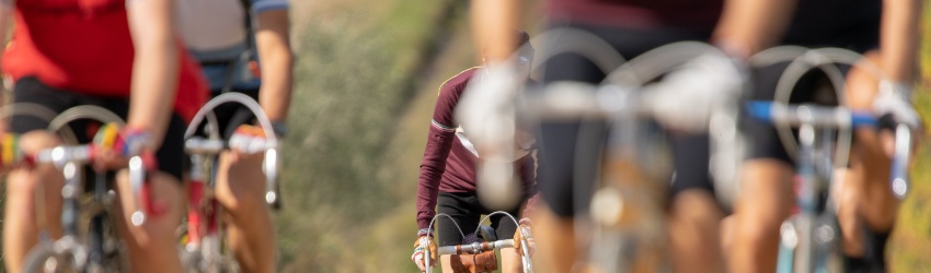 people-riding-bicycle-road-city